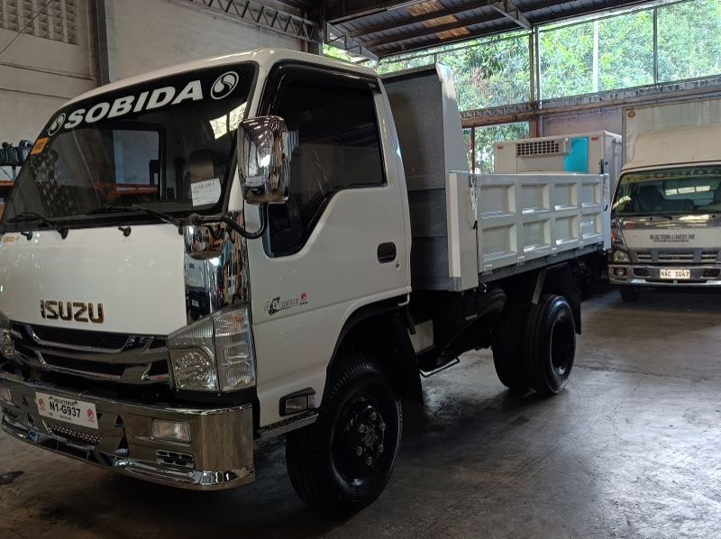 2023 Isuzu elf surplus recontidioned dropside  dump truck nkr  n-series 300 series canter tornado pictures