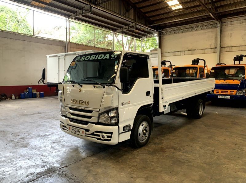 2023 Isuzu elf nkr reconditioned surplus drop side truck n-series  canter 300 series tornado pictures