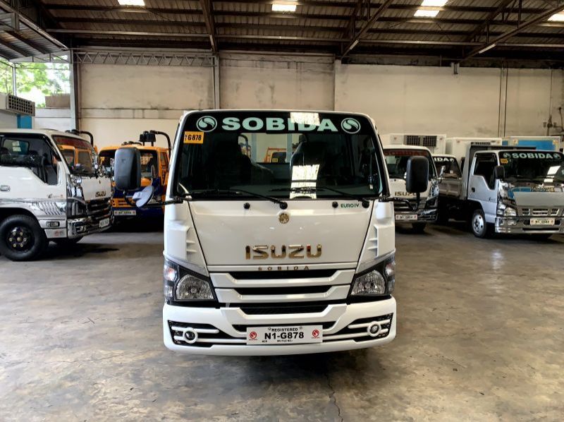 2023 Isuzu elf nkr reconditioned surplus drop side truck n-series  canter 300 series tornado pictures