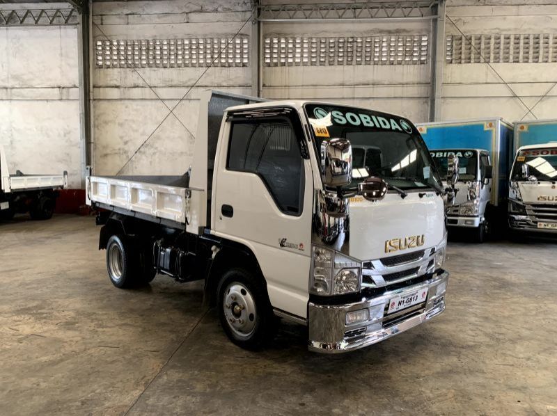 Used Isuzu elf surplus reconditioned  dropside  mini dump truck nkr canter  n-series 300 series tornado  for sale in Manila, Philippines