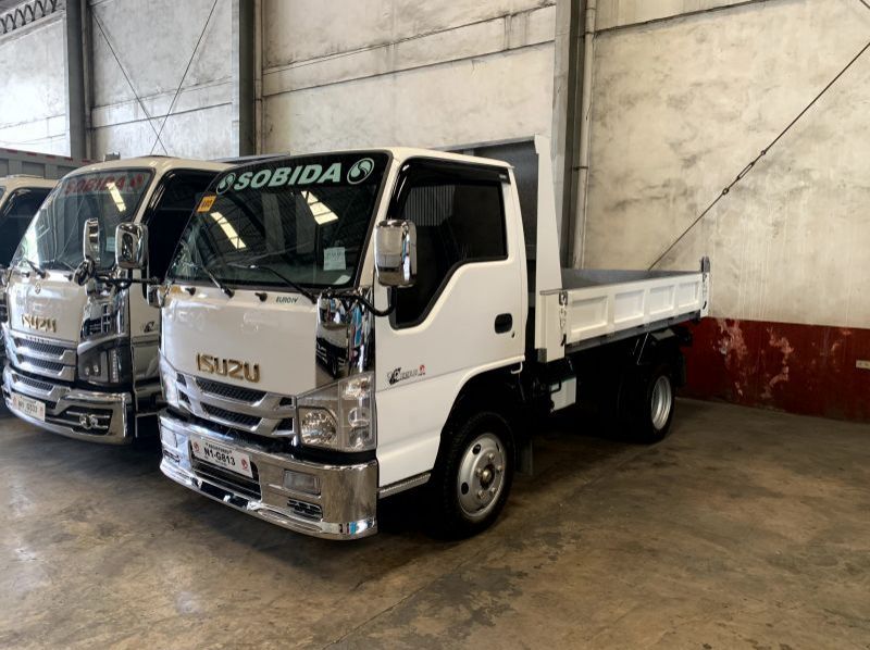 2023 Isuzu elf surplus reconditioned  dropside  mini dump truck nkr canter  n-series 300 series tornado pictures