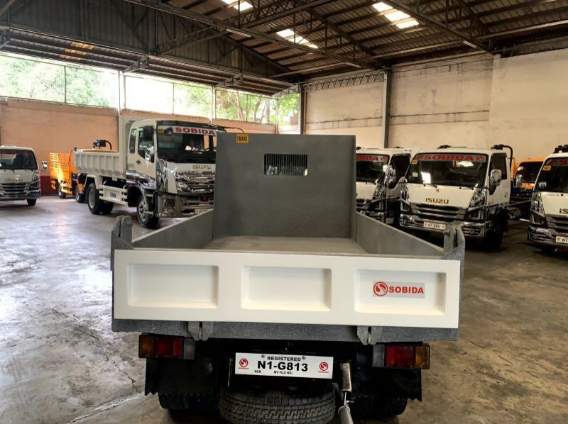 2023 Isuzu elf surplus reconditioned  dropside  mini dump truck nkr canter  n-series 300 series tornado pictures