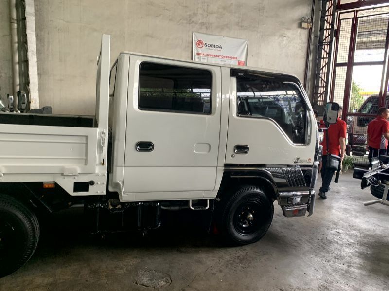 2023 Isuzu elf sobida nkr- double cab drop side n-series canter 300 series tornado pictures