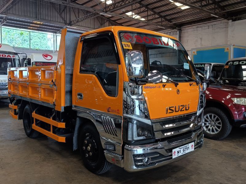 2023 Isuzu elf surplus  remanufactured nkr bb version 3 dropside dump truck n-series canter 300 series tornado pictures