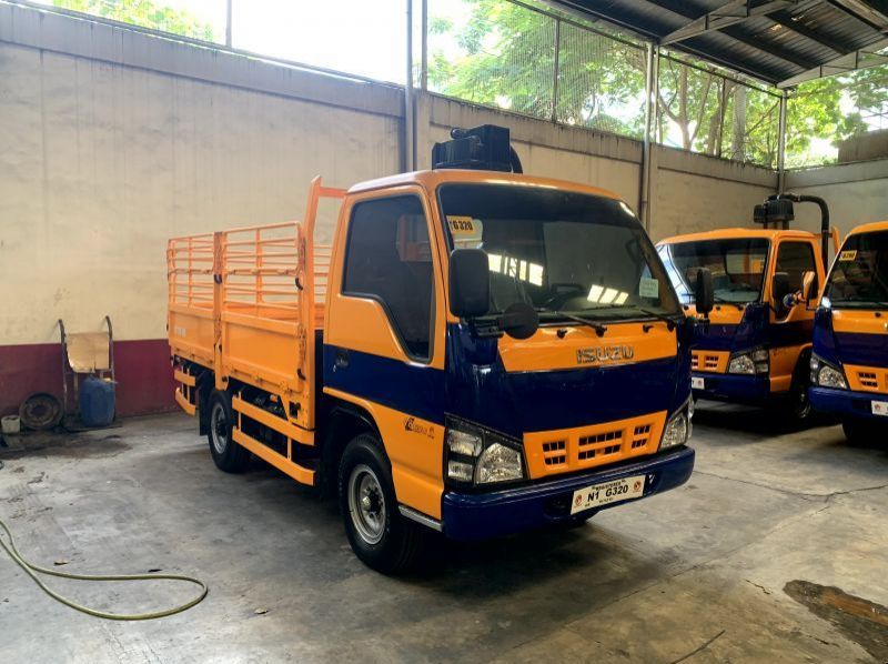 2023 Isuzu isuzu elf reconditioned nkr surplus dropside with stakebody  n-series canter 300 series tornado pictures