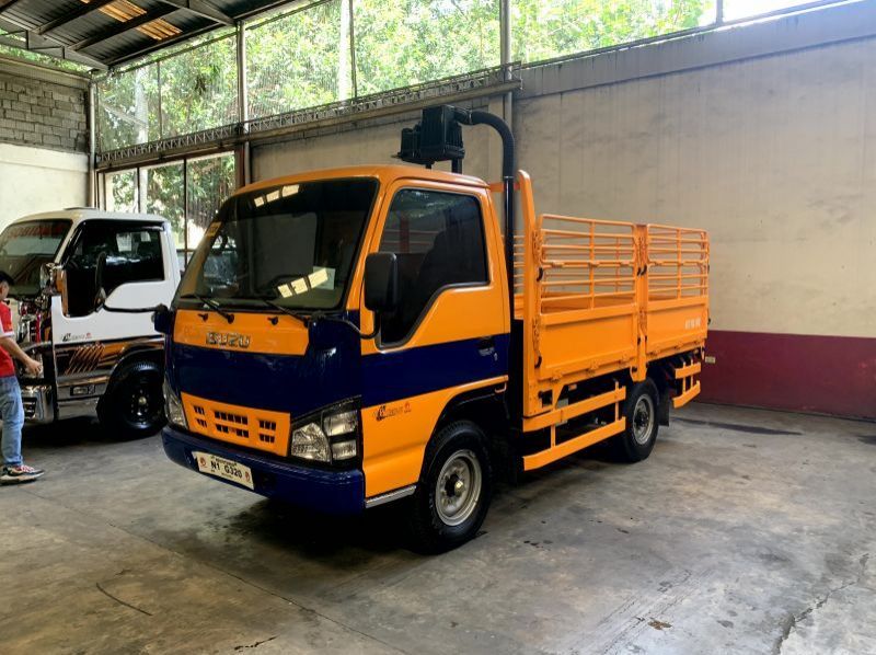 2023 Isuzu isuzu elf reconditioned nkr surplus dropside with stakebody  n-series canter 300 series tornado pictures