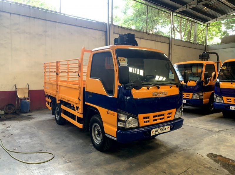 2023 Isuzu isuzu elf reconditioned nkr surplus dropside with stakebody  n-series canter 300 series tornado pictures