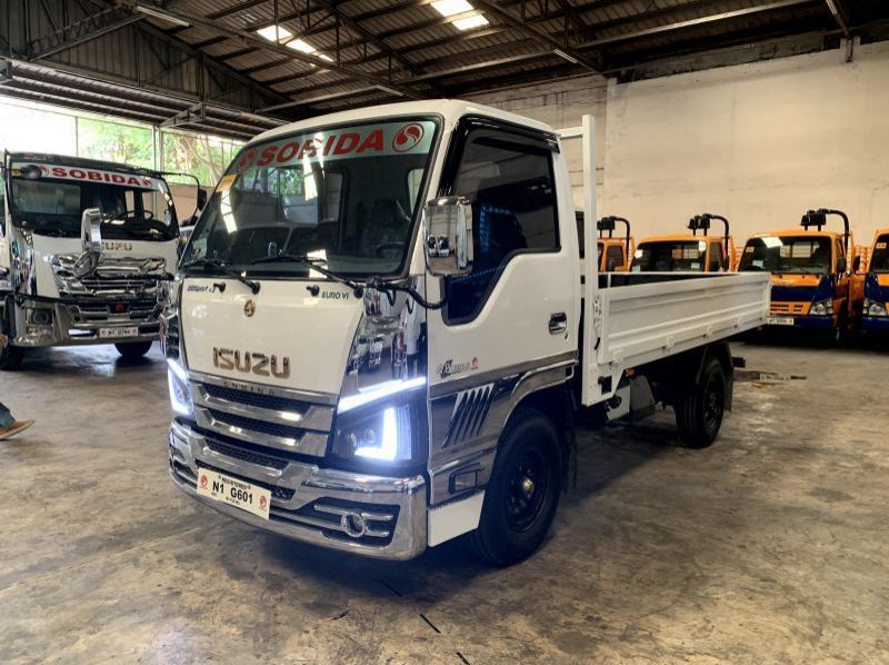 2023 Isuzu isuzu elf surplus drop side truck n-series canter 300 series tornado pictures